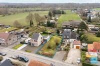 Perceel bouwgrond voor half open bebouwing te Grembergen. 1