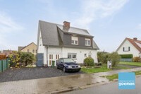 Rustig gelegen open bebouwing met 4 slpk, garage + ruime tuin 1