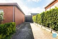 Degelijke open bebouwing met 3 slaapkamers, 2 garage en tuin. 2