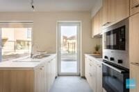 Moderne nieuwbouwwoning half open met 3 slpk te St Gillis 10
