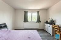 Rustig gelegen energiezuinige woning met doorrit naar achter 18