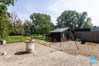Op te frissen woning met prachtige tuin te koop in Wichelen. 14