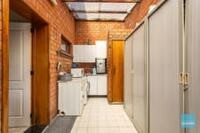 Op te frissen woning met prachtige tuin te koop in Wichelen. 5