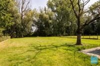 Op te frissen woning met prachtige tuin te koop in Wichelen. 2