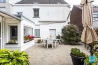 Degelijke halfopen bebouwing met 4 slpks, garage en tuin. 21
