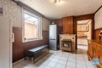 Degelijke rijwoning met 3 slpks, tuin, loods en autostaanplaatsen. 6