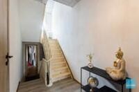 Degelijke rijwoning met 3 slpks, tuin, loods en autostaanplaatsen. 9