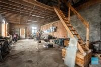 Degelijke rijwoning met 3 slpks, tuin, loods en autostaanplaatsen. 17