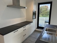 Modern nieuwbouwappartement met ruim terras en groen uitzicht 8