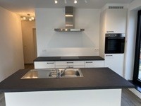 Modern nieuwbouwappartement met ruim terras en groen uitzicht 7